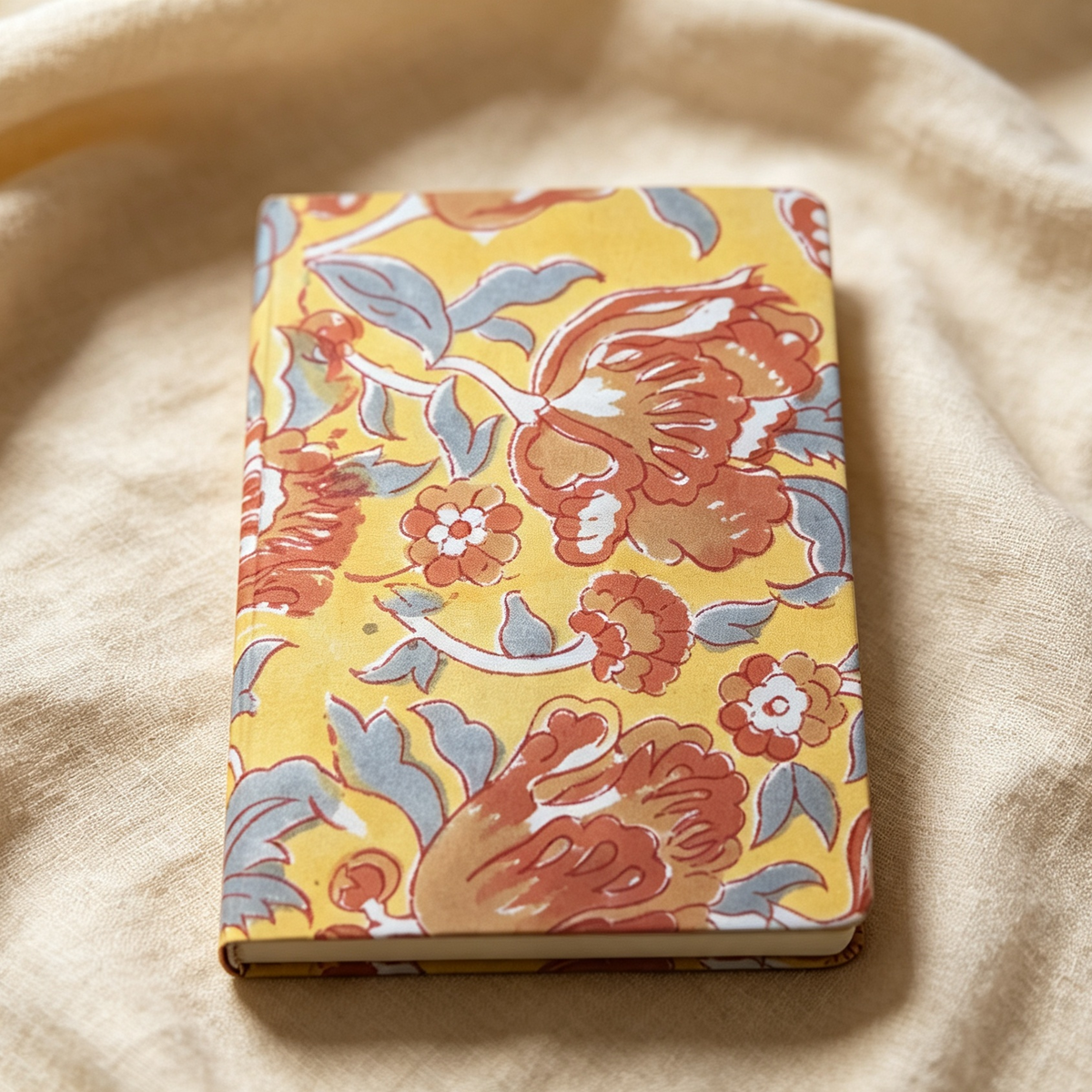 Saffron Bloom hand block print journal cover in yellow and orange floral pattern